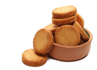 Shortbread biscuits in clay pot, breton style, tea pastry with butter isolated on white