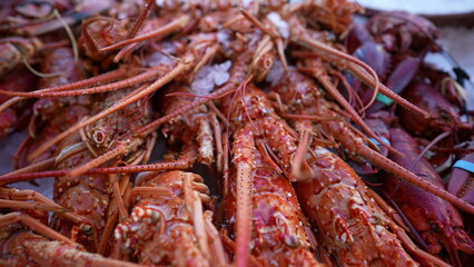 Sea food for sale. Lobsters and shrimps on display at food market