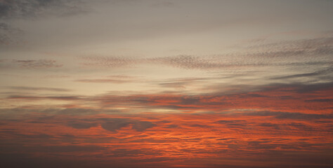 Fototapeta premium Sunset sky. Abstract nature background. Dramatic blue with orange colorful clouds in twilight time.