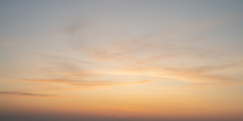 Sunset sky. Abstract nature background. Dramatic blue with orange colorful clouds in twilight time.