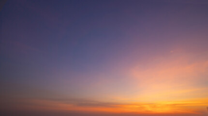 Sunset sky. Abstract nature background. Dramatic blue with orange colorful clouds in twilight time.