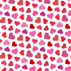 Small colorful multicolored hearts isolated on white background. Cute seamless pattern. Vector simple flat graphic illustration. Texture.
