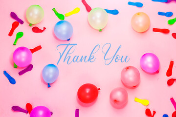 Thank You concept with colorful ballons isolated on pink background