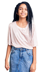 Obraz premium Cute african american girl wearing casual clothes looking positive and happy standing and smiling with a confident smile showing teeth