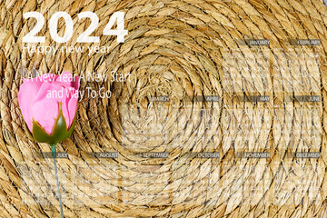 pink rose on Esparto halfah texture , Natural Fiber with 2024 year calendar