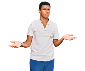Young arab man wearing casual clothes clueless and confused with open arms, no idea concept.