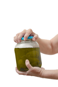 Woman’s Hands Trying To Open Pickle Jar Isolated On White
