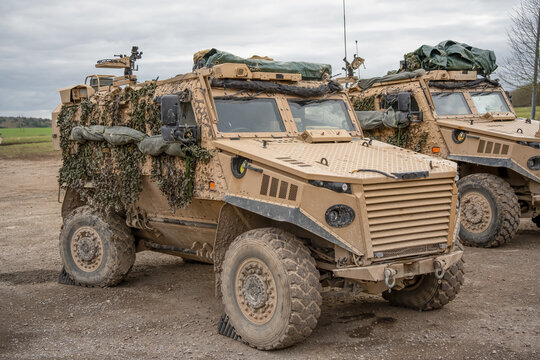 close-up of a British army Foxhound 4x4-wheel drive protected patrol vehicle with broken rear axle, rear steering, Wiltshire UK