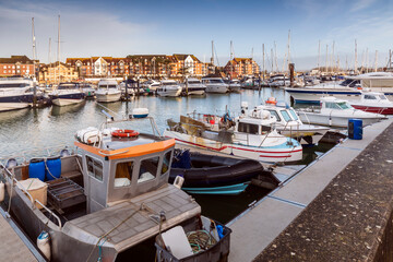 Fishing boats moored in Weymouth Harbour in Dorset.