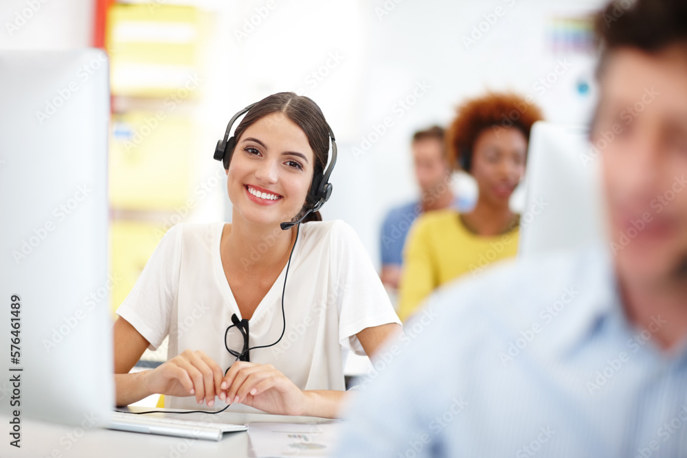 Poster this call center outshines the rest. cropped portrait of an attractive young call center operator in