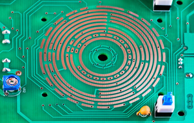 Changeover switch integrated in PCB copper layer, on-off button or resistor trimmer. Closeup of...