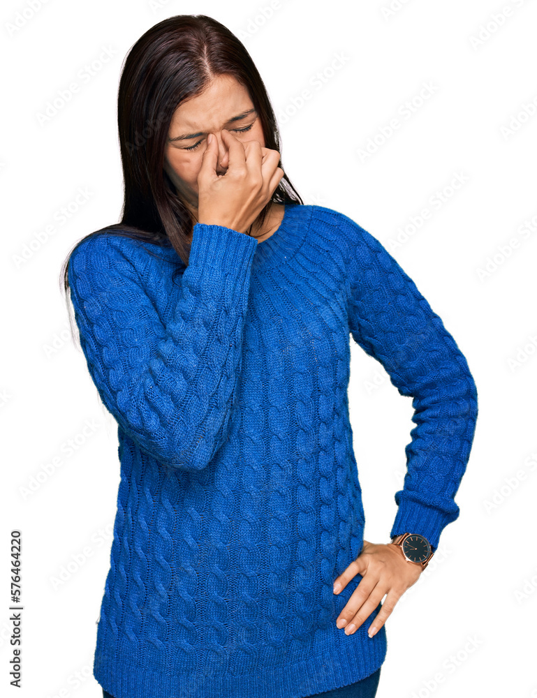 Sticker Young hispanic woman wearing casual clothes tired rubbing nose and eyes feeling fatigue and headache. stress and frustration concept.