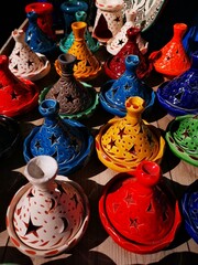 colorful tagine pots in a gift shop in Essaouira, Morocco