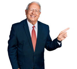 Senior man with grey hair wearing business suit and glasses with a big smile on face, pointing with hand finger to the side looking at the camera.