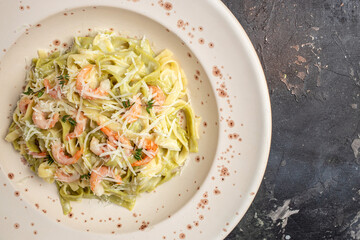 Pasta with prawns thyme and lime, fettuccine pasta. Italian food. recipe background. Close up