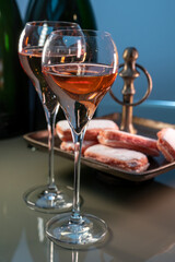 Tasting of rose brut Champagne sparkling wine in cellars of gran cru wine house in Epernay, wine tour in Champagne, France