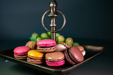 Macarons or French macaroon  sweet meringue-based confection made with egg white, icing sugar, granulated sugar, almond meal, and food colouring