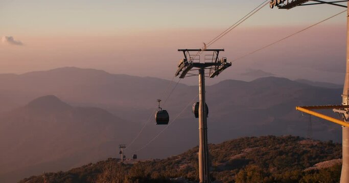 Gondola cable car lift in mountain, vacation outdoor activities