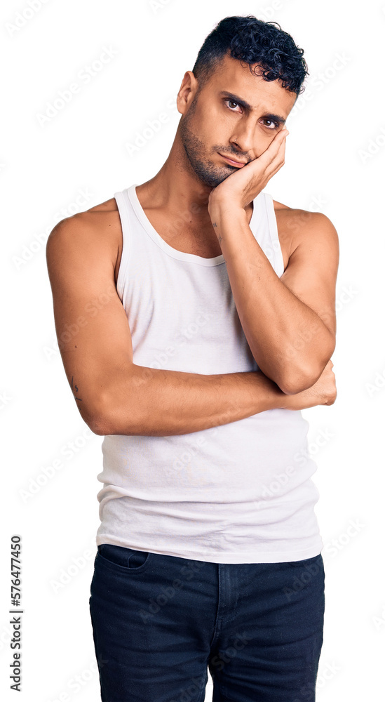 Sticker young hispanic man wearing casual clothes thinking looking tired and bored with depression problems 