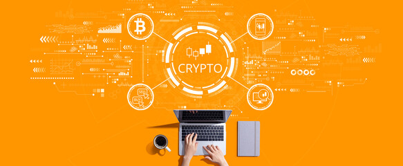 Crypto Trading theme with person working with a laptop