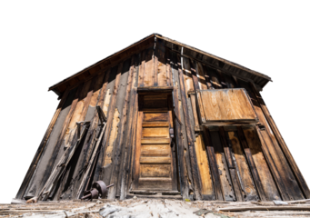 View of abandoned mining cabin on National Forest land in the California Sierra Nevada Mountains.  Isolated with cut out background.