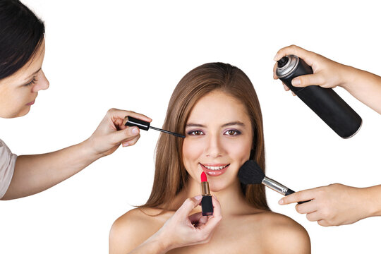 Professional makeup artist doing makeup girl