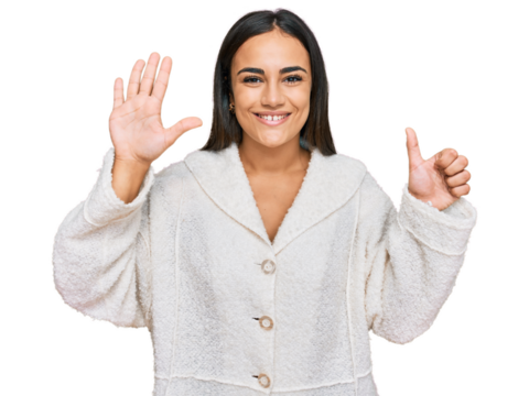 Young brunette woman wearing casual clothes showing and pointing up with fingers number six while smiling confident and happy.