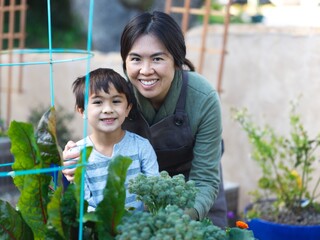 Mother and son in garden 