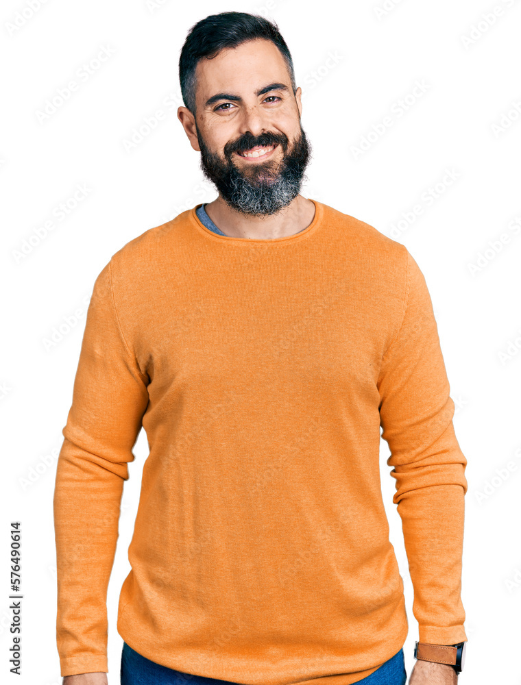 Wall mural Hispanic man with beard wearing casual winter sweater with a happy and cool smile on face. lucky person.