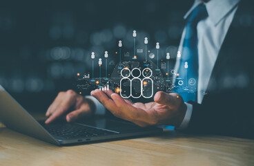 Businessman using computer with global network technology, managing communication, relationship, exchange of transactional data. Customer service across media networks, online digital marketing