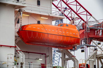 Rescue boat hanging from a ship 