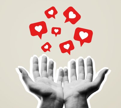 Creative picture of hand showing big red heart symbol