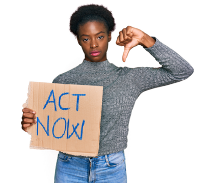 Young african american girl holding act now banner with angry face, negative sign showing dislike with thumbs down, rejection concept
