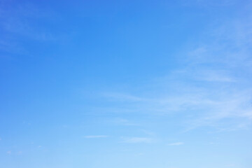 Blue sky background and white clouds soft focus, and copy space horizontal shape. - 576496823