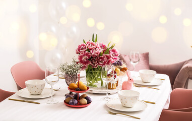 Festive table setting for Easter celebration in dining room