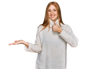 Young irish woman wearing casual winter sweater showing palm hand and doing ok gesture with thumbs up, smiling happy and cheerful