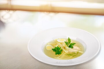 Tasty fresh hot soup dish in a bowl