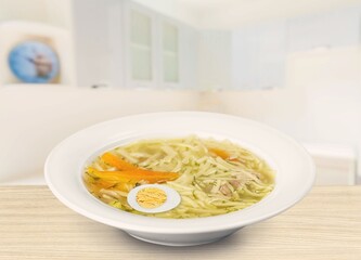 Tasty fresh hot soup dish in a bowl