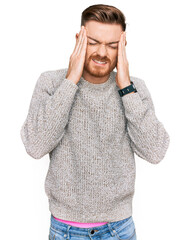 Young redhead man wearing casual winter sweater with hand on head, headache because stress....