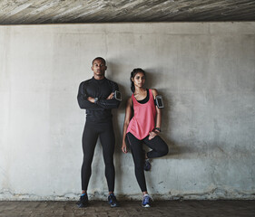 They love staying fit together. Shot of a sport young couple out for a run.