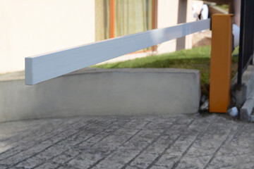 Obraz premium Closed boom barrier on autumn day outdoors