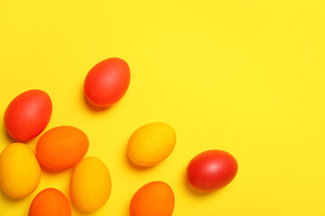 Painted Easter eggs on yellow background