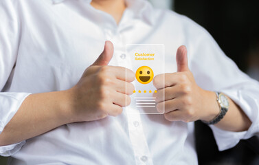 Feedback via the Internet. Positive Review.Client Satisfaction Surveys,review. Customer service and Experiences Concept. Happy Client showing thumb up happy smile face and Five Star Rating to Giving 