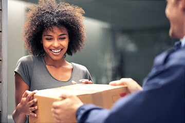 Yay, Ive been counting the hours.... Shot of a courier making a delivery to a smiling customer.