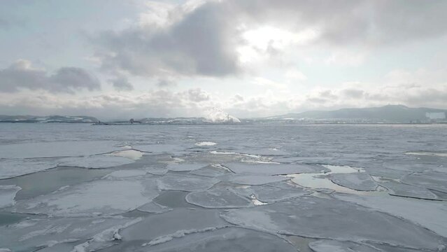 Hokkaido,Japan - February 25, 2023: Drift ice in the offing of the Monbetsu port, Hokkaido, Japan
