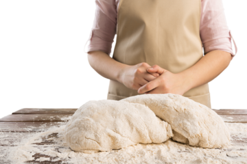 Making dough by female hands. Woman cooking.