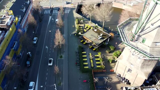 Amsterdam, Netherlands: drone view city 4K. Mill, Canals, Bridges, Dutch Buildings 2023