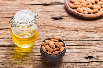 Almond oil and seeds (Prunus dulcis) close-up image