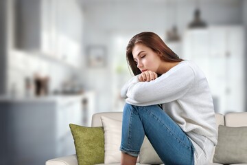 Young sad person sits at home. Problems concept