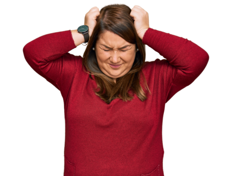 Beautiful brunette plus size woman wearing casual clothes suffering from headache desperate and stressed because pain and migraine. hands on head. - Powered by Adobe